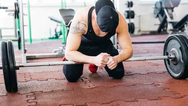 Why Your Lower Back Hurts After Deadlifts? (And The Simple Form Fix You’re Missing)